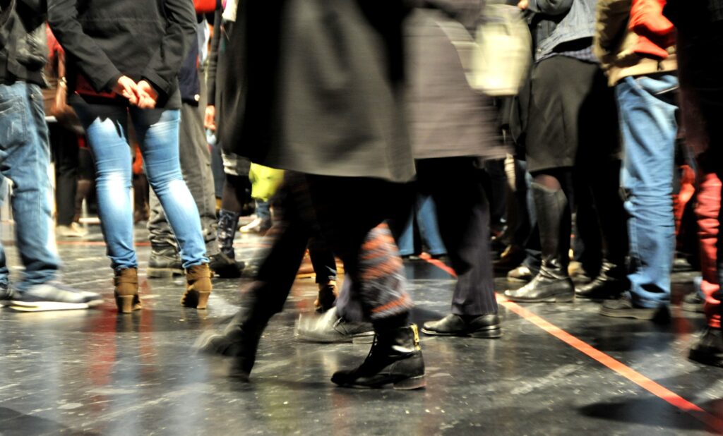 Close up on the legs of people walking. photo: Marion Borriss