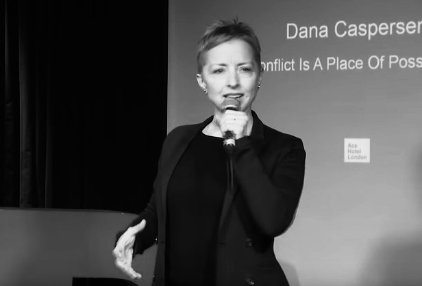 Dana Caspersen giving her TEDx talk; Conflict is a place of possibility.